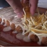 canelones con salsa bechamel y queso